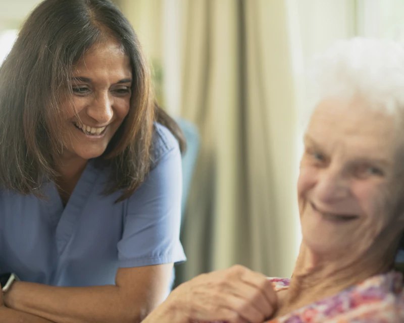 Nurse caring for an older patient